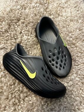 Nike Black Slip-On Foam Clogs with Neon Yellow Swoosh Accent